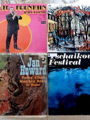 Vintage vinyl pack with 4 LP records (Jazz, Country, Classical, Saxophone)