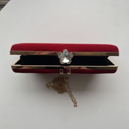 Women's red velvet evening clutch bag like new with gold details