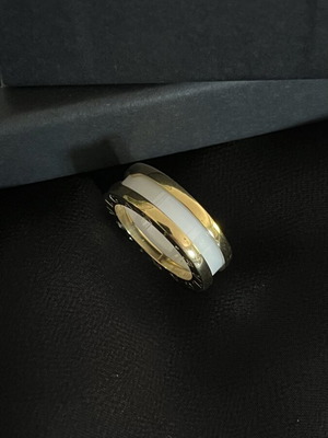 Ring new, gold tone with white detail, stainless steel