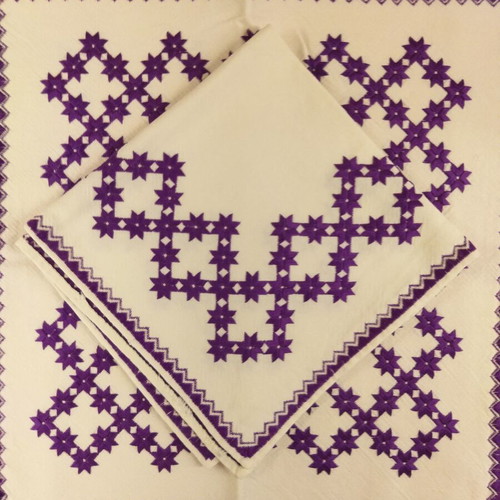 Handicrafts used, set of three table linens with purple star pattern