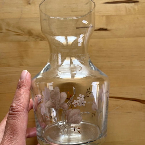 Glass bulb vase used with botanical detail