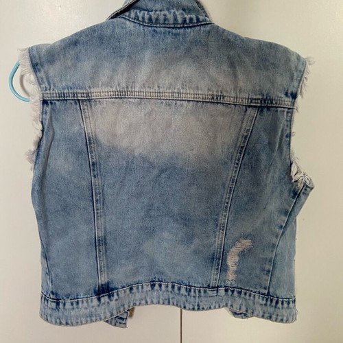 Denim short vest used with iron-on patches