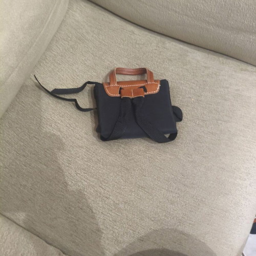 Foldable backpack like new, black with brown details