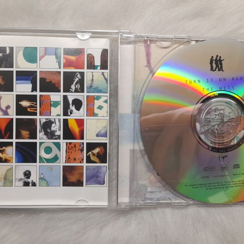Genesis Turn It On Again The Hits Album CD like new