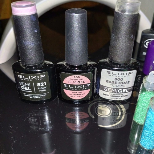 Sun nail lamp and 10 nearly full nail polishes