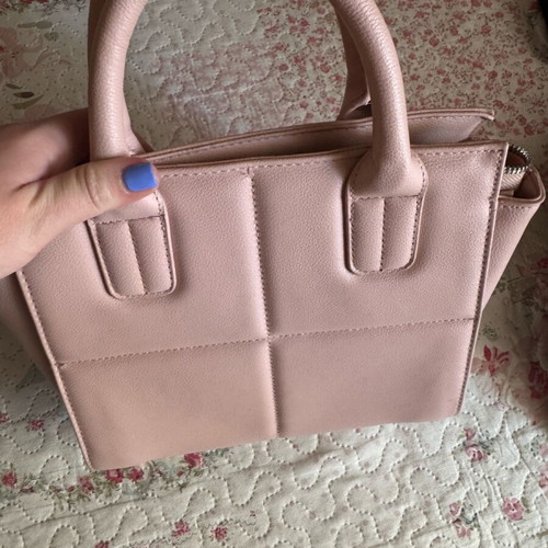 Pink handbag used with broken zipper