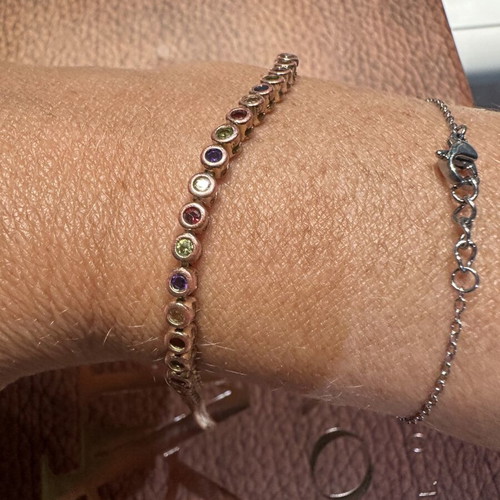 Tennis bracelet with multicolored round rhinestones and secure clasp