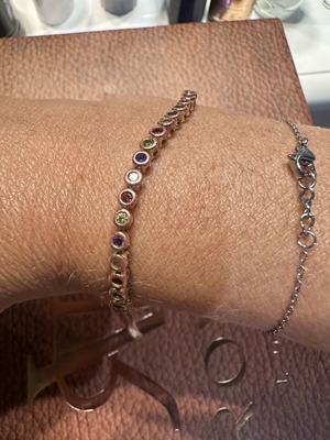 Tennis bracelet with multicolored round rhinestones and secure clasp