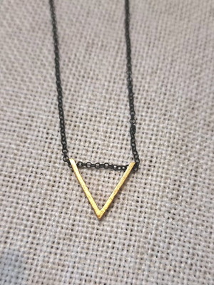 Minimalist silver necklace with gold-plated V element