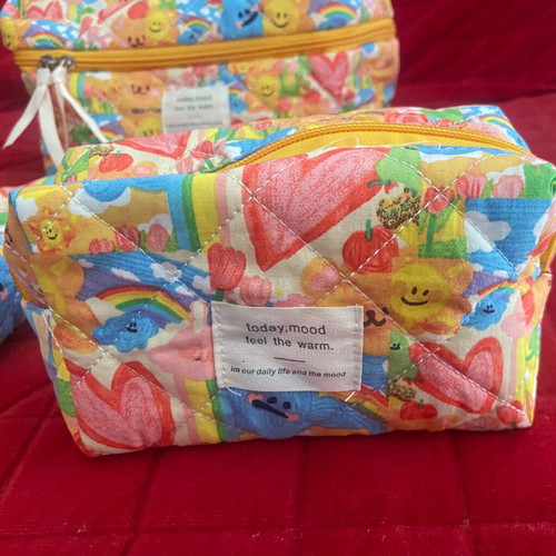 Set of three toiletry bags new, multicolored, various sizes