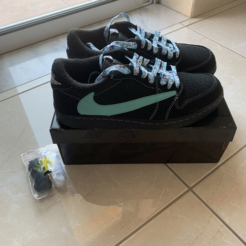 Nike Air Jordan black sneakers with floral laces