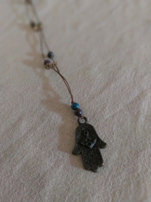 Long boho hamsa hand necklace like new, brown and blue