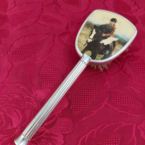 Vintage boudoir clothes brush from the 1970s, used