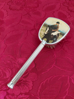 Vintage boudoir clothes brush from the 1970s, used