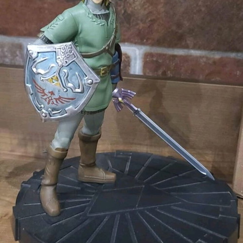 Zelda Twilight Princess statues new with strategy guide and ocarina