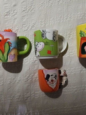 Set of 4 children's mugs with 3D figures like new