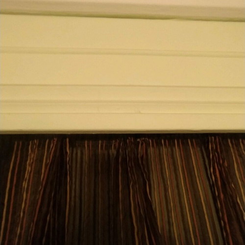 Curtain for window in dark brown shades with beige stripes like new