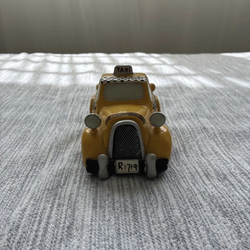 Taxi piggy bank, porcelain