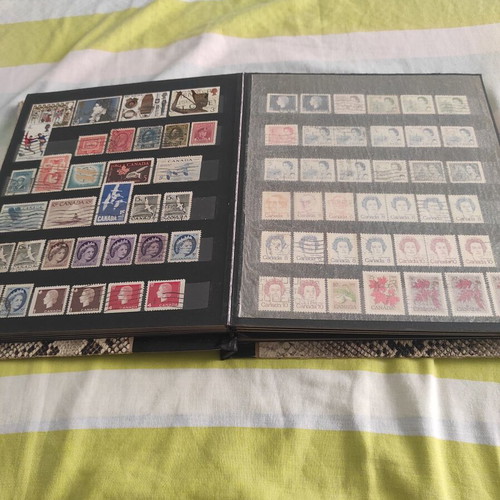Stamps like new, 702 pieces with album