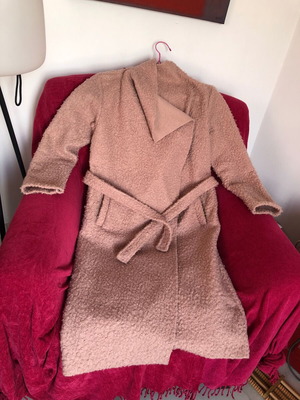 Dusty pink boucle coat used with belt and hidden pockets