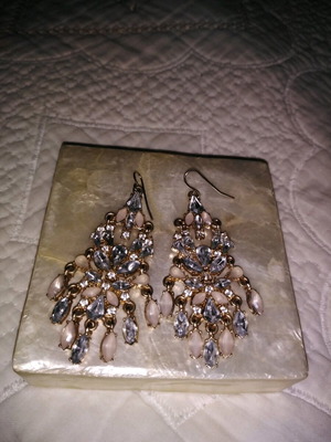 Earrings hanging like new with stones