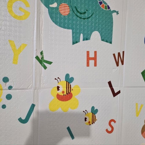 Children's play mat with animal and alphabet design