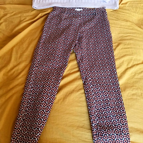 H&M fitted fabric pants like new, small, red with geometric patterns