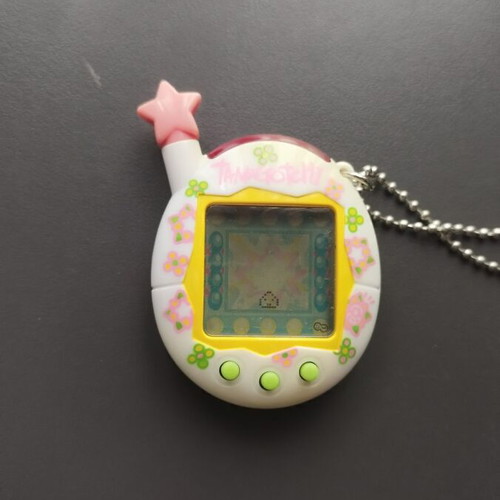 Tamagotchi Connection Pink Star 2004 used, white with flowers