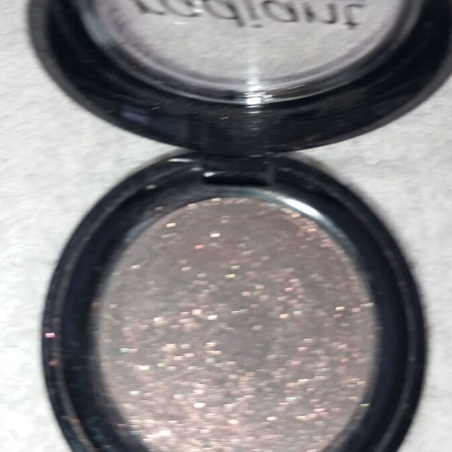 Radiant eyeshadow used, shade 216 with gold-brown glitter