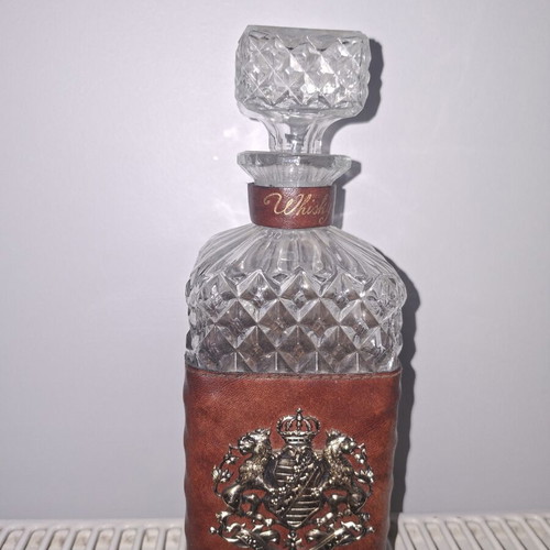 Whiskey bottle with aristocratic crest