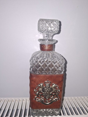 Whiskey bottle with aristocratic crest