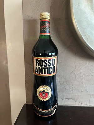 Rosso Antico bottle like new, antique