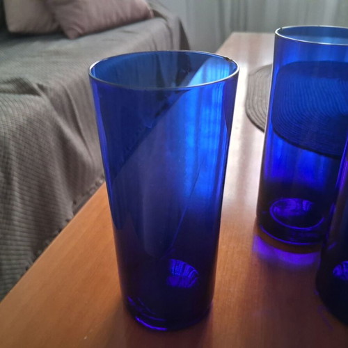 Set of 4 blue glass ouzo glasses and matching ice bucket like new