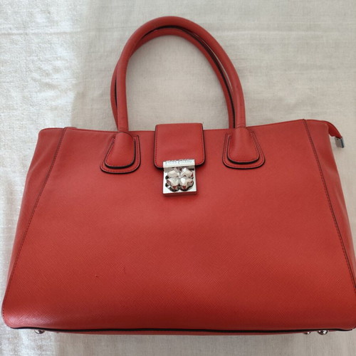Folli Follie Ladies Handbag used, burnt orange with flower fastening