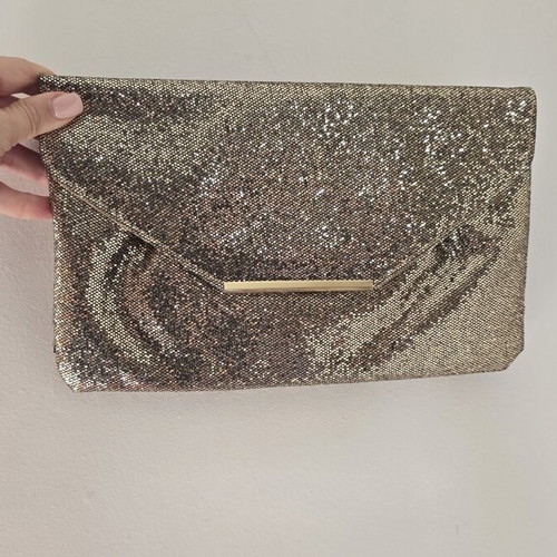 Clutch bag with subtle gold shimmer, like new