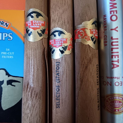 Lot of 7 used collectible cigar and tobacco packages, empty