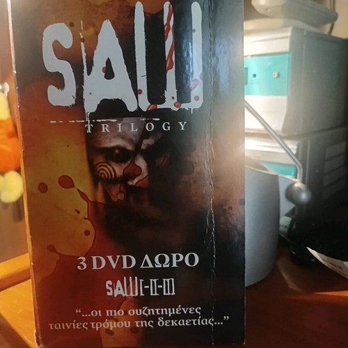 Saw trilogy DVD used, subtitles, horror thriller
