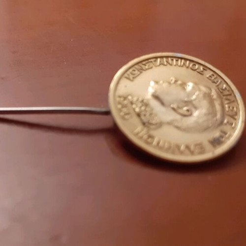 Collectible pin 1966 like new, gold-colored