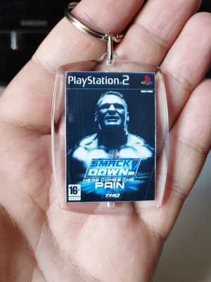 Smack Down Here Comes the Pain PS2 acrylic keychain