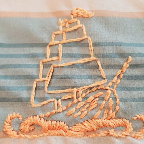 Decorative pillow with golden hand embroidery and sea motifs, new
