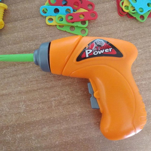 Battery-Powered Screwdriver Toy like new with shapes and screws