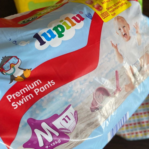Fisher-Price children's swim vest and blocks used with free swim diapers