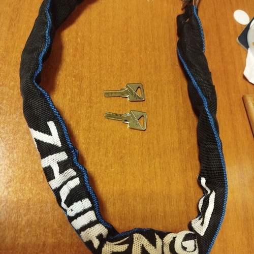 Anti-theft chain for motorcycle or bicycle like new with two keys