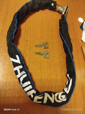 Anti-theft chain for motorcycle or bicycle like new with two keys