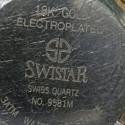 Swistar watch 18k gold plated used with visible signs of wear