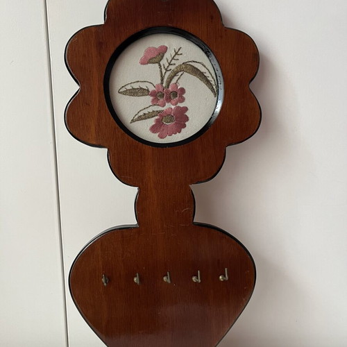 Vintage wooden wall key holder with flower and heart embroidery used