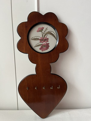 Vintage wooden wall key holder with flower and heart embroidery used