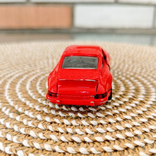 Solido Porsche 911 Carrera RS 2.7 toy car used, red with black stripes