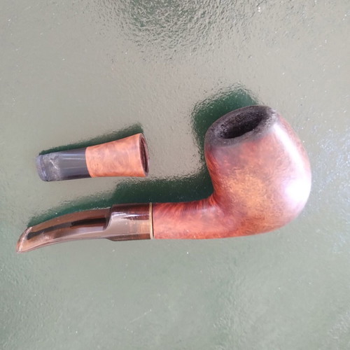 Pipe made of heather wood used with replacement mouthpiece