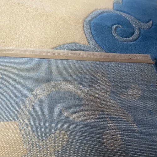 Embossed rug used, blue and beige, 1.97x1.40 m